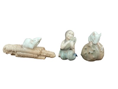 Lot 1111 - Three Royal Copenhagen models - Mouse on Corn Cob 512, Mermaid holding a Fish 2348 and Mouse on Chestnut 511