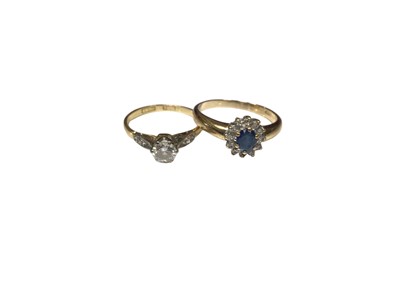 Lot 140 - Diamond single stone ring with diamond set shoulders in platinum setting on 18ct gold shank and 9ct gold sapphire and diamond cluster ring (2)