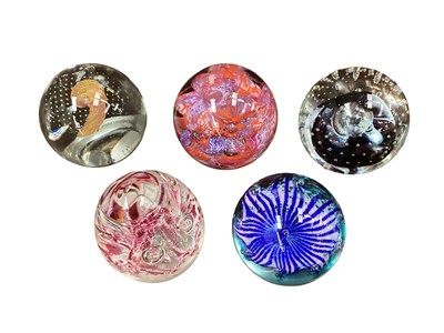 Lot 441 - Five Caithness paperweights - Petunias, Gentleheart and Moonflower by Colin Terris, Brimstone by Alastair MacIntosh and Reflections 94