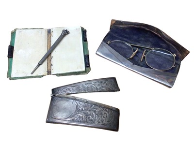 Lot 160 - Victorian silver mounted notebook with propelling pencil, silver card case and a silver spectacles case (3)