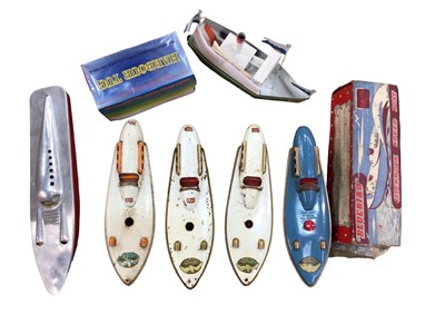 Lot 1892 - Five tin plate Bluebird clockwork speed boats, plus one other and Coastal Rose steam boat, plus two kites