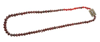 Lot 660 - Antique garnet faceted bead necklace with Georgian seed pearl and hairwork clasp