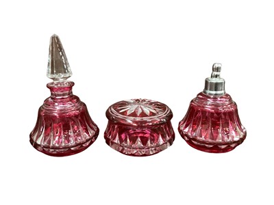 Lot 1169 - Three pieces of Val St Lambert cranberry glass to include scent bottle with stopper, atomiser and pot with lid