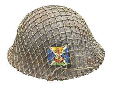 Lot 787 - Second World War British MK II steel helmet with rough texture camouflage finish, labelled 1st Royal Marine Commando