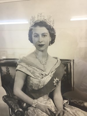 Lot 84 - H.M.Queen Elizabeth II, fine and large signed presentation Coronation year 1953 portrait photograph by Dorothy Wilding, the youthful Queen wearing the Order of The Garter, signed in ink ' Elizabeth...