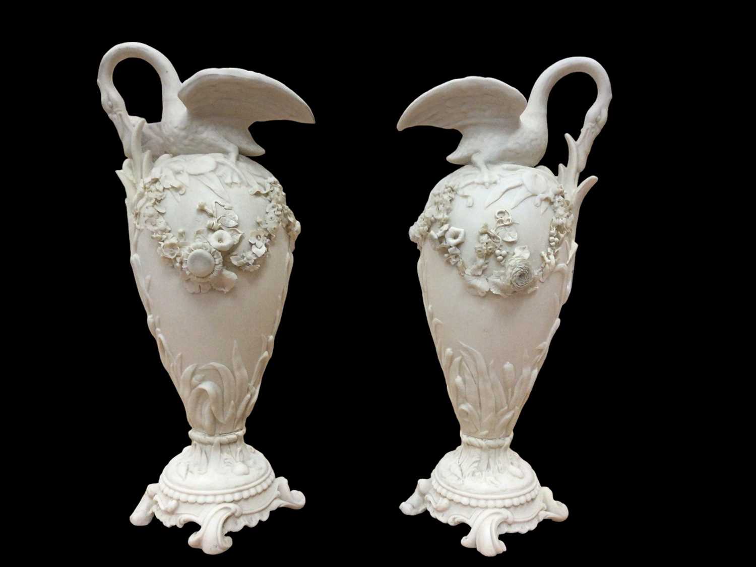 Lot 38 - Pair of 19th century French white ewers mounted with swans