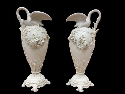 Lot 38 - Pair of 19th century French white ewers mounted with swans