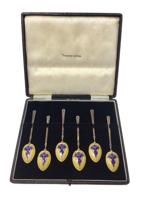 Lot 567 - cased set of silver and enamel spoons