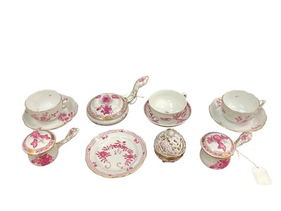 Lot 1186 - Eleven pieces of Herend porcelain with hand painted floral decoration including cups and saucers