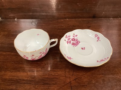 Lot 1186 - Eleven pieces of Herend porcelain with hand painted floral decoration including cups and saucers
