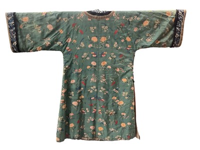 Lot 2180 - 19th century Chinese woman's blue woven silk robe. All over flowers, grapes and butterflies. Pink silk lining.