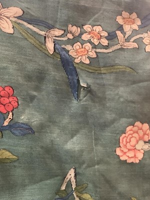 Lot 2180 - 19th century Chinese woman's blue woven silk robe. All over flowers, grapes and butterflies. Pink silk lining.