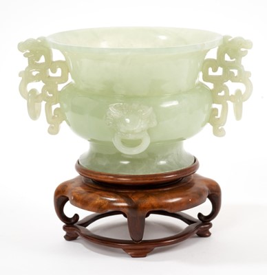 Lot 655 - Chinese carved green jade vase  on wooden stand