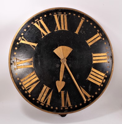 Lot 1081 - 19th century style Tavern clock with circular black painted dial and gilt roman numerals, 79cm diameter