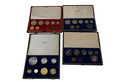 Lot 571 - South Africa - Mixed proof sets in cases of issue to include 1970 ten coin set containing 22ct gold Two Rand & One Rand, 1964 seven coin set containing silver & AE coins, 1986, 1989 eight coin sets...
