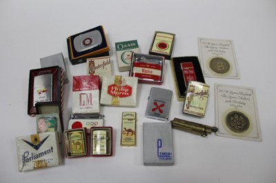 Lot 2539 - Cartier Les Must de Cartier gold plated cigarette lighter in original Cartier box with guarantee card dated 11.3.1984, Christian Dior gold plated lighter, S.J. Dupont lighter in box, various other...