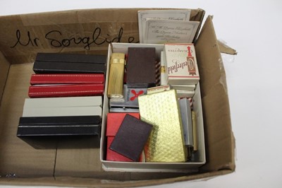 Lot 2539 - Cartier Les Must de Cartier gold plated cigarette lighter in original Cartier box with guarantee card dated 11.3.1984, Christian Dior gold plated lighter, S.J. Dupont lighter in box, various other...