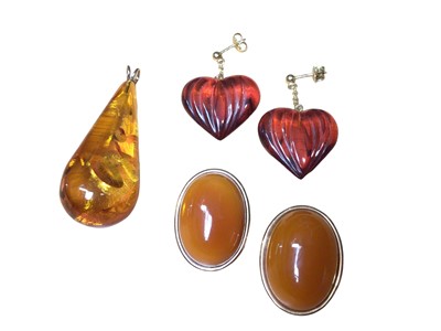 Lot 218 - Pair of 14ct gold mounted amber earrings signed Halberstadt Willy Fagert, Denmark, one other pair of heart shaped earrings and a 14ct gold mounted amber pendant