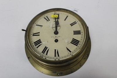 Lot 2543 - J.W. Benson, London, a brass bulkhead clock, white enamel dial, the case 27cm diameter