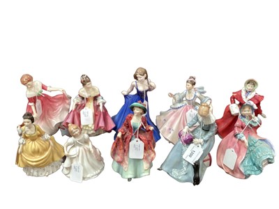 Lot 1200 - Ten Royal Doulton figures - Dorothy HN3098, Coralie HN4929, Margaret HN1989, Gift Of Love HN4791, The Skater HN3439, Rebecca HN2805, Spring Morning HN1922, Amanda HN2996, My First Friend and Southe...