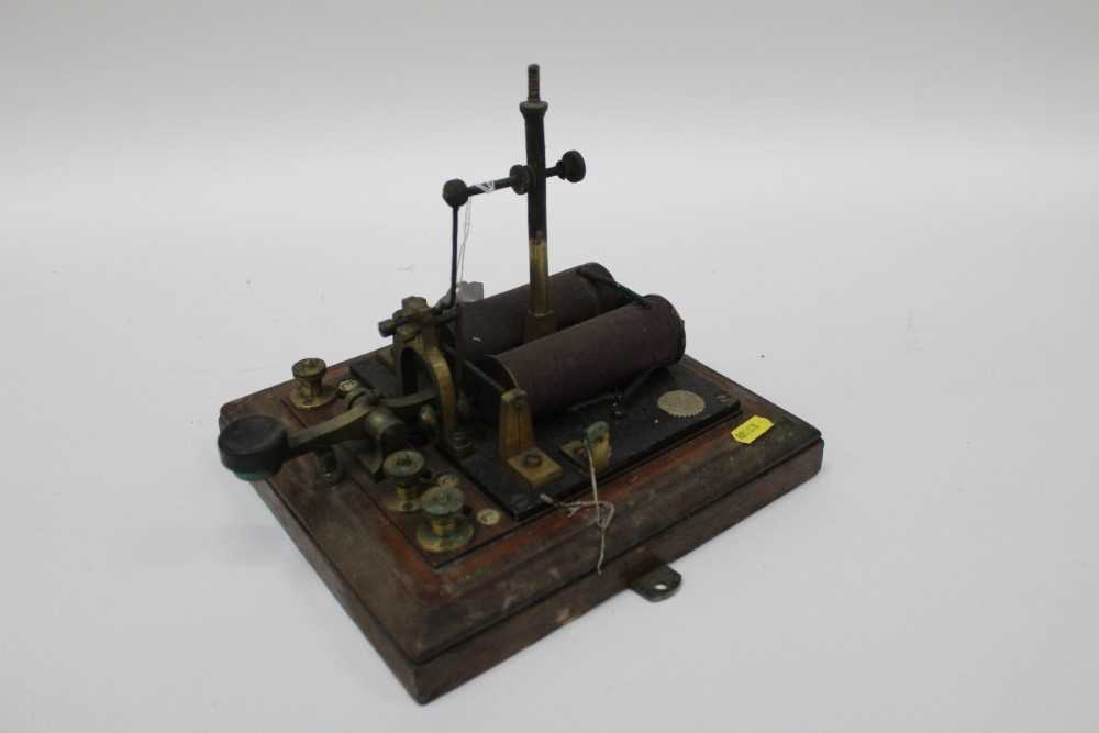 Lot 2551 - Antique telegraph machine, the wooden base measuring 23cm x 25cm