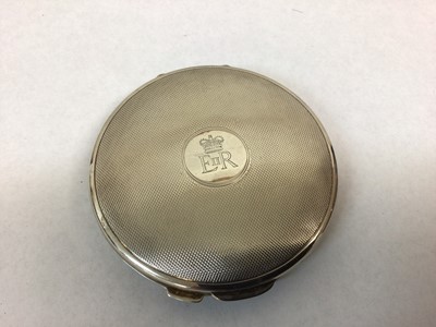 Lot 109 - H.M.Queen Elizabeth II, silver presentation circular powder compact with engraved crowned ER II cipher and engine turned decoration (Birmingham 1956) Plante. 8cm diameter with blue velvet pouch