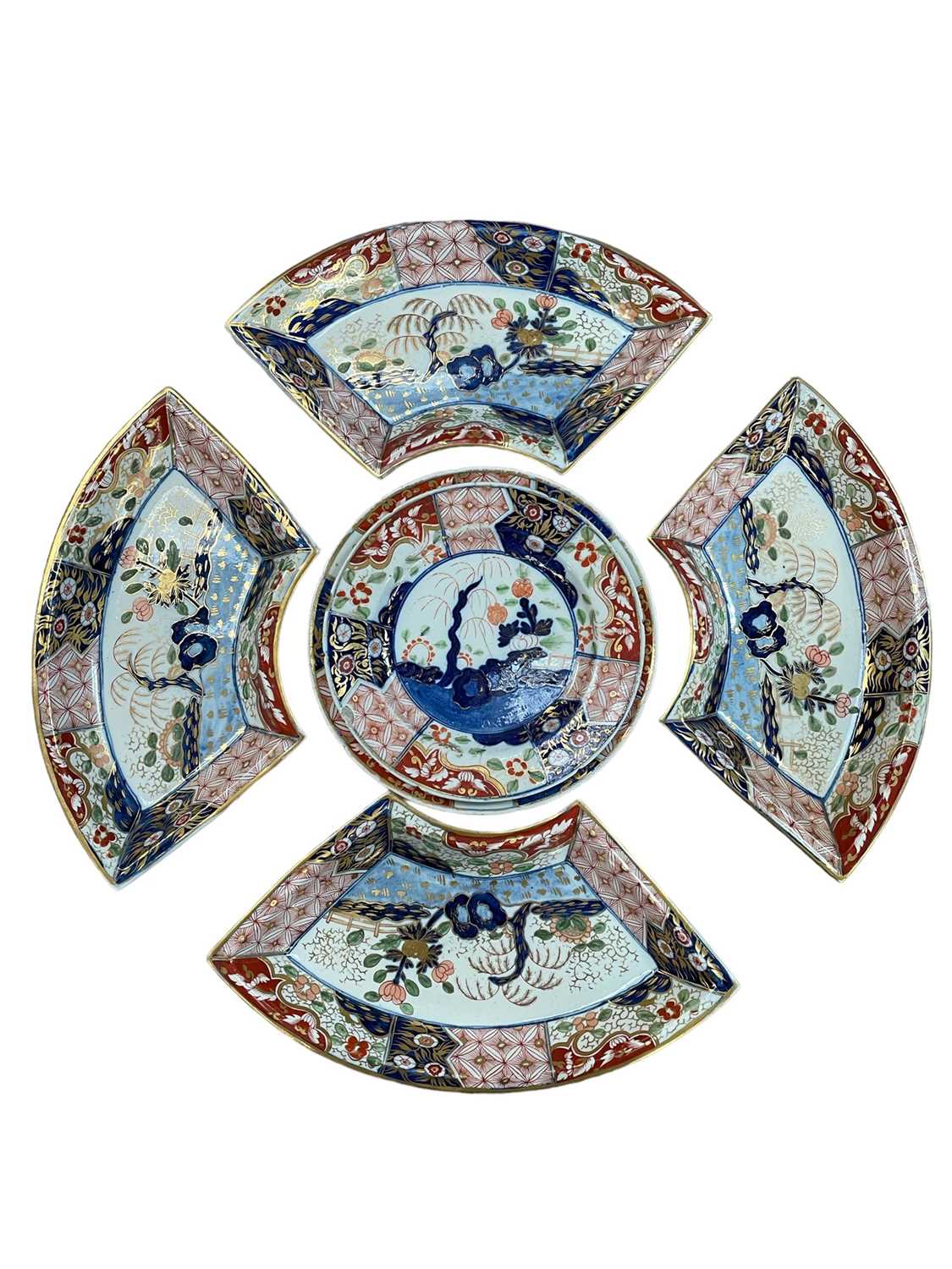 Lot 17 - Four 19th century Masons crescent shaped dishes in the Imari taste together with three other similar plates