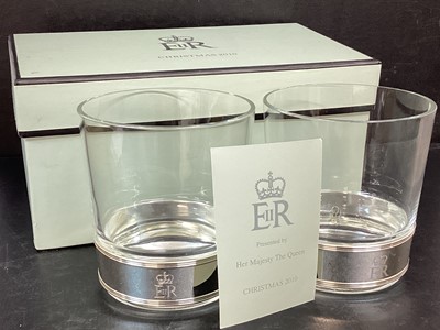 Lot 130 - H.M.Queen Elizabeth II, 2010 Royal Household Christmas present of a pair of glass tumblers with plated collars and etched Royal ciphers in original box with Royal cipher to lid and presentation car...