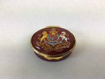 Lot 132 - H.M.Queen Elizabeth II, 2012 Royal Household Christmas present Halcyon Days oval enamel box decorated with Royal Arms and 2012, inscribed inside the lid ' The Diamond Jubilee Presented by Her Majes...
