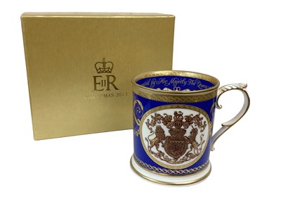Lot 133 - H.M.Queen Elizabeth II, 2013 Royal Household Christmas present of a porcelain mug decorated with Hanoverian Royal coat of Arms and ' Presented by Her Majesty The Queen Christmas 2013' in original f...
