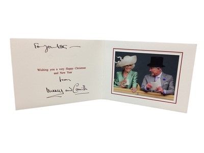 Lot 135 - T.R.H. Prince Charles and Camilla Duchess of Cornwall (now T.M. King Charles III and Queen Camilla), signed and inscribed 2000s Christmas card with colour photogragh of the happy couple horse raci...