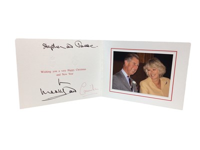Lot 136 - T.R.H. Prince Charles and Camilla Duchess of Cornwall (now T.M. King Charles III and Queen Camilla), signed and inscribed 2000s Christmas card with colour photogragh of the relaxed happy couple