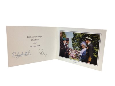 Lot 138 - H.M.Queen Elizabeth II and H.R.H. The Duke of Edinburgh, signed 2004 Christmas card with colour photograph of the Royal couple at the D-Day commemoration with veterans