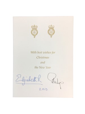 Lot 141 - H.M.Queen Elizabeth II and H.R.H. The Duke of Edinburgh, signed 2013 Christmas card with colour portrait photographs of the Royal couple