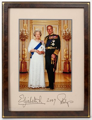 Lot 144 - H.M.Queen Elizabeth II and H.R.H The Duke of Edinburgh, fine 2009 signed presentation portrait photograph of the Royal couple wearing Orders and decorations signed in ink on mount ' Elizabeth R 200...
