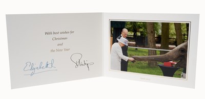 Lot 148 - H.M.Queen Elizabeth II and H.R.H. The Duke of Edinburgh, signed 2017 Christmas card with twin gilt ciphers to cover, colour photograph of the Royal couple to the interior with envelope