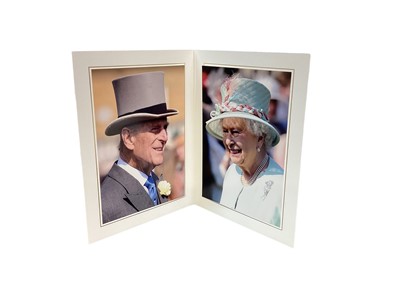Lot 152 - H.M.Queen Elizabeth II and H.R.H. The Duke of Edinburgh, signed 2013 Christmas card with twin gilt ciphers to cover, twin colour portrait photographs of the Royal couple to the interior with envelo...