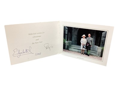 Lot 157 - H.M.Queen Elizabeth II and H.R.H. The Duke of Edinburgh, signed 2008 Christmas card with twin gilt ciphers to cover, colour photograph of the Royal couple at Crathie Kirk to the interior with envel...