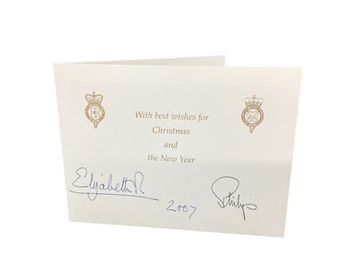 Lot 158 - H.M.Queen Elizabeth II and H.R.H. The Duke of Edinburgh, signed 2007 Christmas card with twin gilt ciphers to cover, colour photograph of the Royal couple with their children and grand children to...