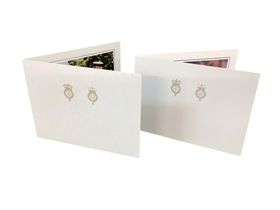Lot 160 - H.M.Queen Elizabeth II and H.R.H. The Duke of Edinburgh, two signed 2003 and 2004 Christmas cards with twin gilt ciphers to cover, colour photograph of the Royal couple to interiors.