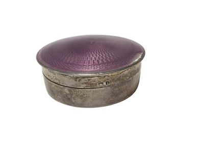 Lot 209 - Mappin & Webb silver and purple enamel round pill box and a continental embossed silver oval box (2)