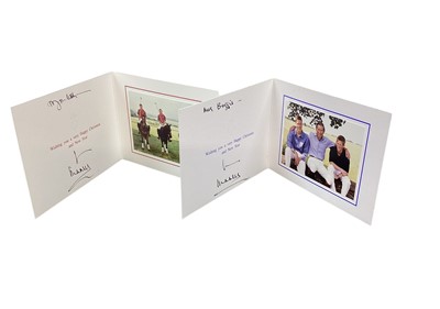 Lot 166 - H.R.H. Prince Charles Prince of Wales (now H.M. King Charles III), two signed and inscribed Christmas cards for 2001 and 1999 with gilt ciphers to covers and charming photographs of the Prince with...