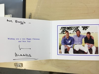 Lot 166 - H.R.H. Prince Charles Prince of Wales (now H.M. King Charles III), two signed and inscribed Christmas cards for 2001 and 1999 with gilt ciphers to covers and charming photographs of the Prince with...