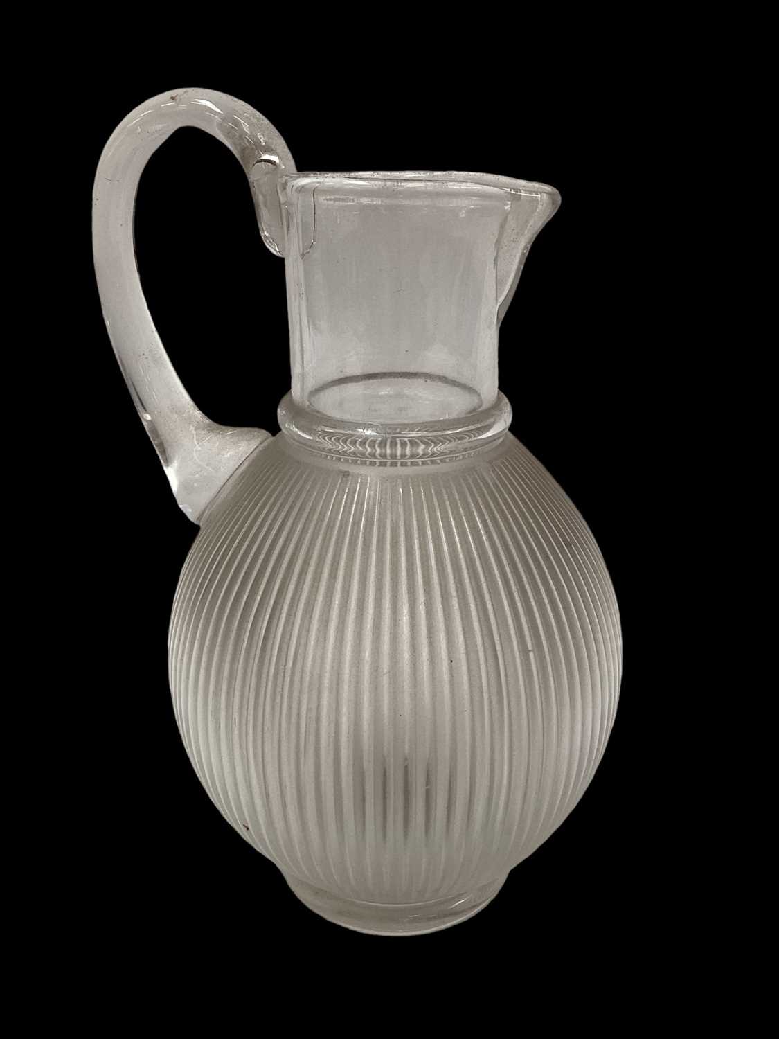 Lot 1229 - Lalique glass jug with ribbed body, signed Lalique France