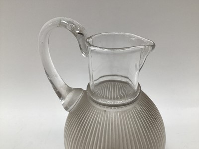 Lot 1229 - Lalique glass jug with ribbed body, signed Lalique France