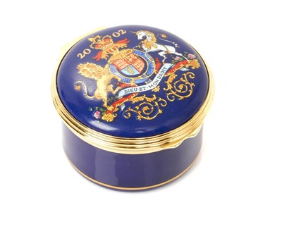 Lot 172 - H.M.Queen Elizabeth II, 2002 Royal Household Christmas present, Halcyon Days circular enamel box with polychrome Royal Arms and 2002 to lid, inscribed inside ' The Golden Jubilee Presented by Her M...