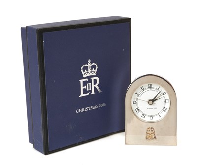 Lot 173 - H.M.Queen Elizabeth II, 2005 Royal Household Christmas present, silver plated alarm clock in domed case with crowned ERII cipher to front and ' Presented by Her Majesty The Quuen Christmas 2005' to...