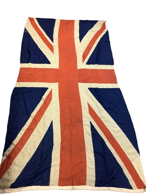 Lot 181 - Very large early 20th century Union Jack flag of printed cotton with original lanyard and toggle  Provenance: The vendors Grandfather was the Commanding Officer of a British Regiment based in Irela...