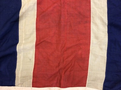 Lot 181 - Very large early 20th century Union Jack flag of printed cotton with original lanyard and toggle  Provenance: The vendors Grandfather was the Commanding Officer of a British Regiment based in Irela...