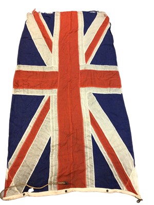 Lot 182 - Large early 20th century Union Jack flag of printed cotton with original lanyard and toggle. 250 x 135 cm Provenance: The vendors Grandfather was the Commanding Officer of a British Regiment based...